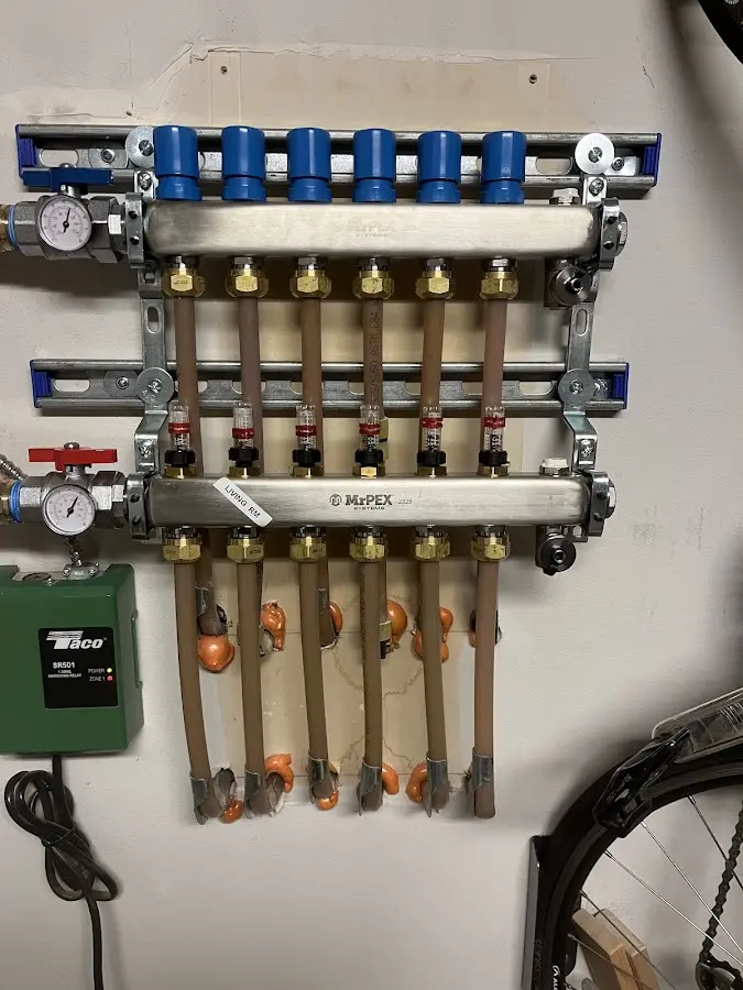 Plumber performing Water Heater Repair at a residential property in Canal Fulton